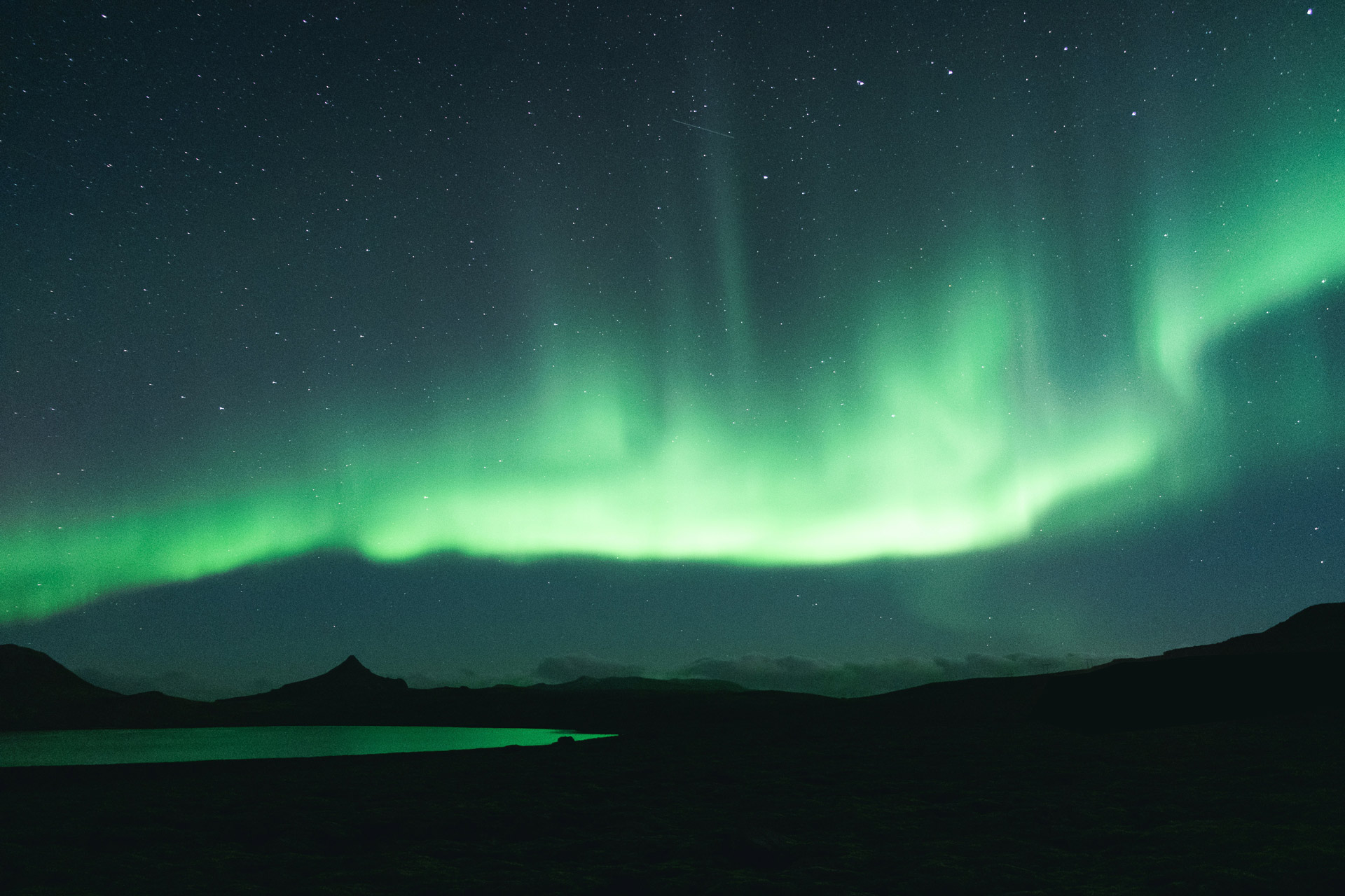 Aurora over Nordic mountains